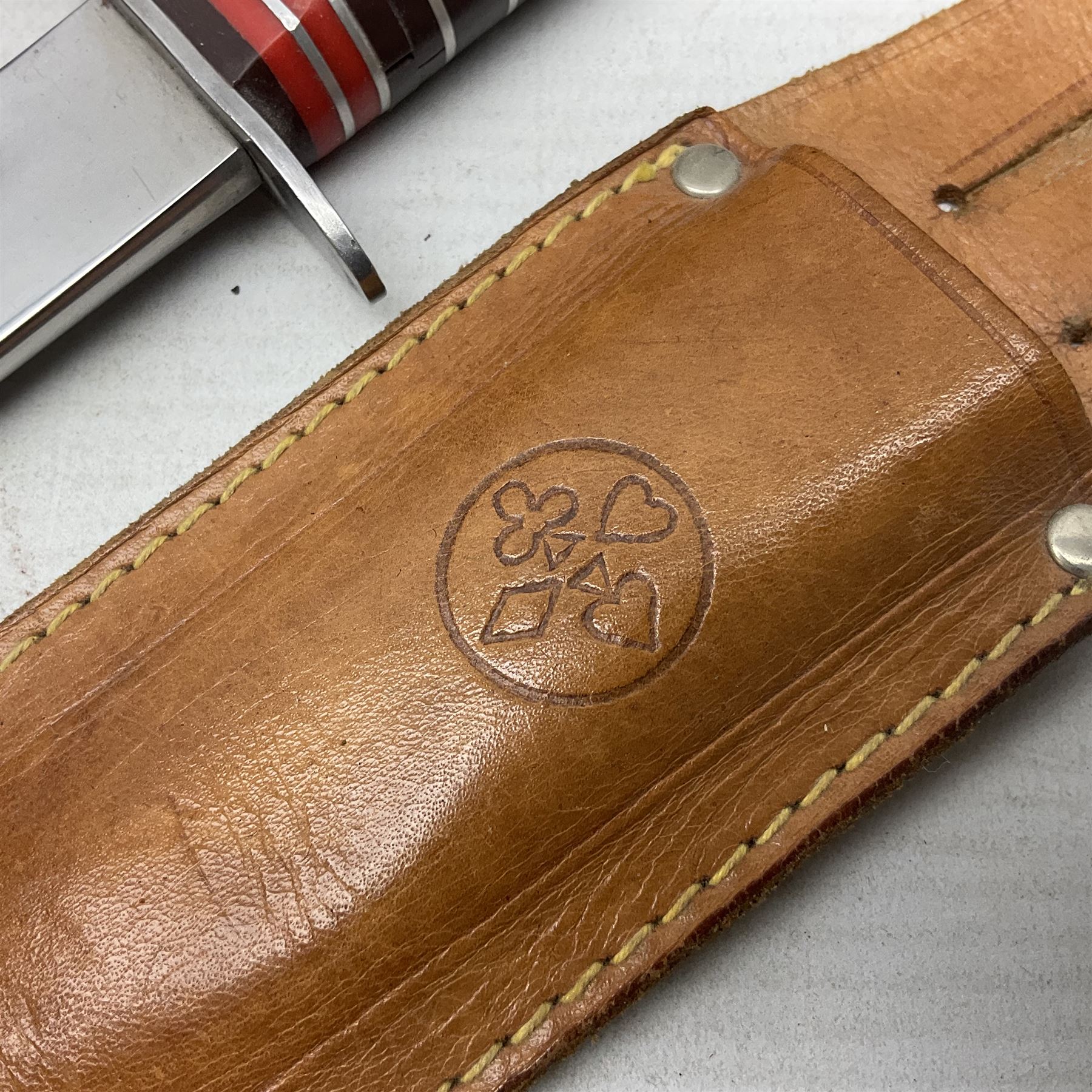 Mundial Brazil bowie knife, the 15.5cm steel blade inscribed 'Sheriff Knife', with banded and aluminium hilt; in leather sheath L29cm overall; British Army felt covered metal water bottle with webbing strap; leather 12-bore cartridge belt; and small pair of non-military binoculars in part case (4)