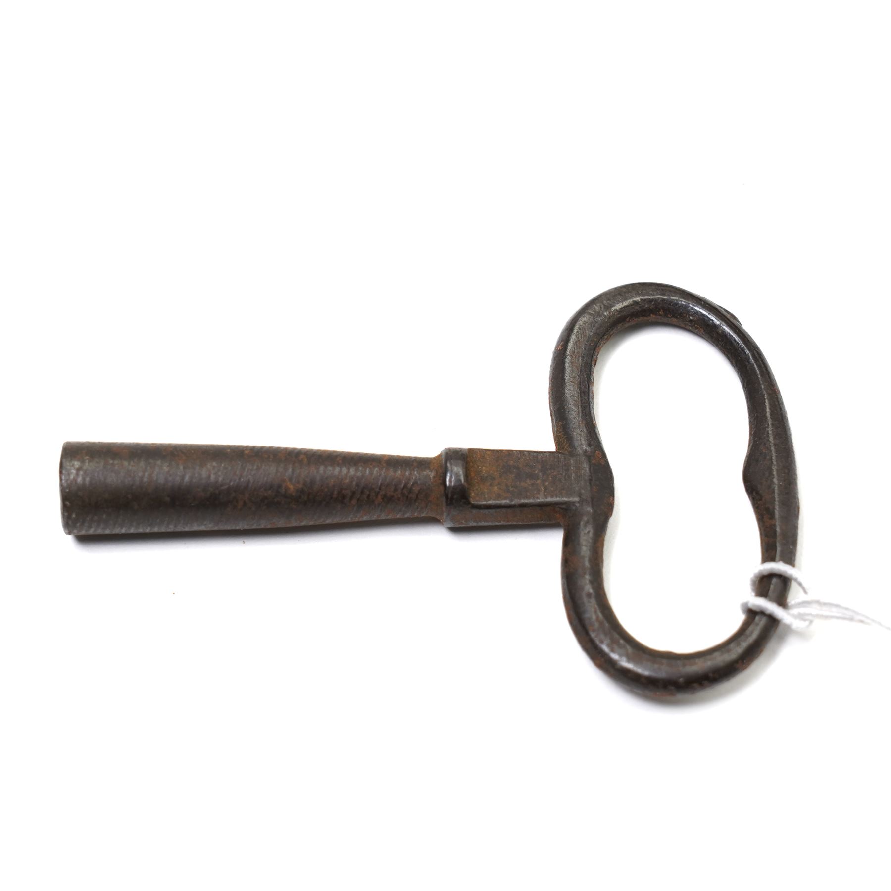 French- early 20th century portico clock garniture, 8-day drum movement decorated with laurel leaves to the glazed bezel and surmounted by a decorative urn with scroll handles, raised by four matching columns on a granite effect oval base with toupee feet, convex enamel dial with gilt pierced hands, Arabic numerals, minute markers and a garland of flowers, twin train Parisian rack striking movement, striking the hours and half hours on a bell. With a sunburst pendulum and key and a matching pair of two-light candelabra.