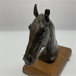 After Sydney March, bronze figure of horses head, wupon a wooden plinth, H17cm