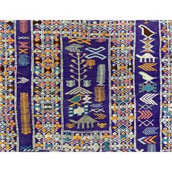 Flat weave violet ground runner, the field set with six panelled and decorated all over with stylised animal and plant motifs, the outer band decorated with repeating geometric design 
