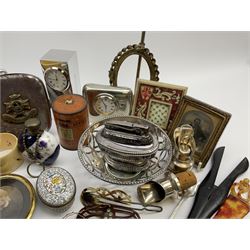 A group of assorted collectables, to include small oval purple guilloche enamel frame, WWII matchbox holder depicting Winston Churchill, Halcyon Days enamel box, Ronson table lighter, ebonised glove stretchers, ivory napkin ring, mother of pearl handled button hook, engine turned cigarette case, etc. 