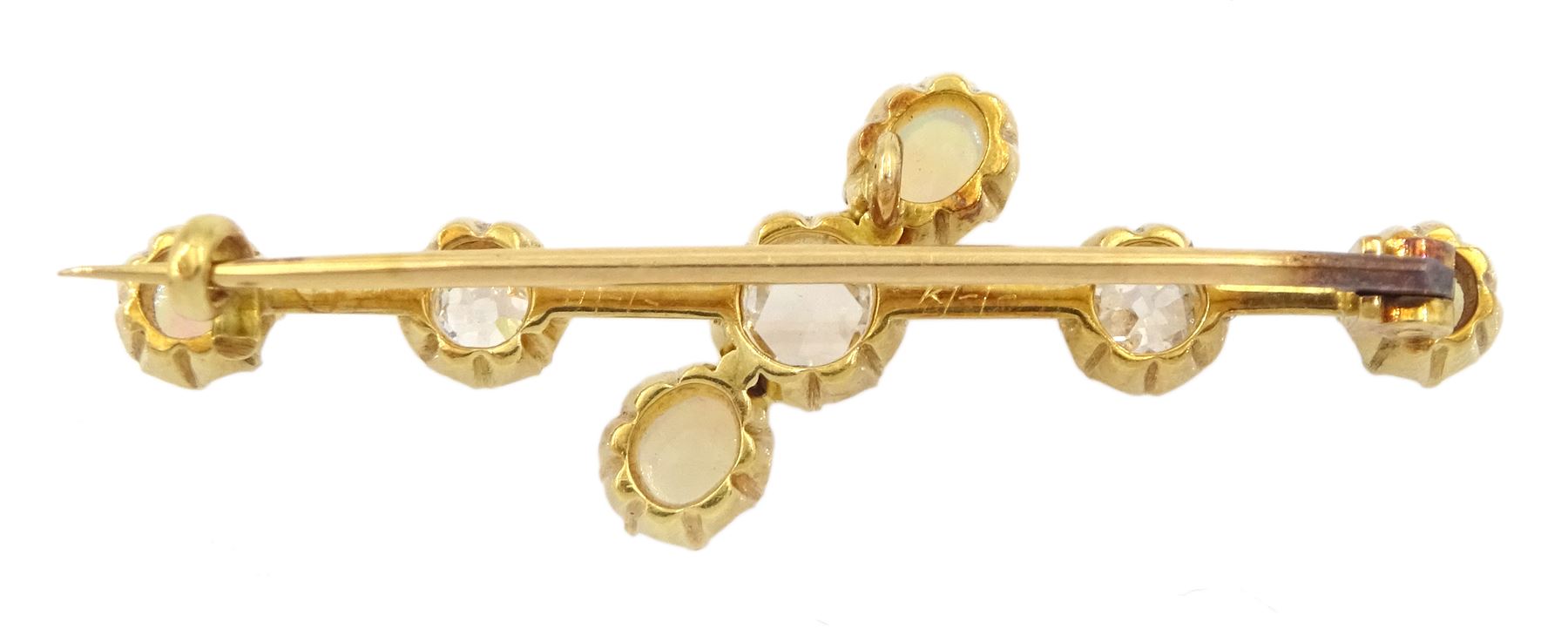 Early 20th century 15ct gold opal and diamond brooch, the central rose cut diamond, with old cut diamonds set either side, total diamond weight approx 0.60 carat