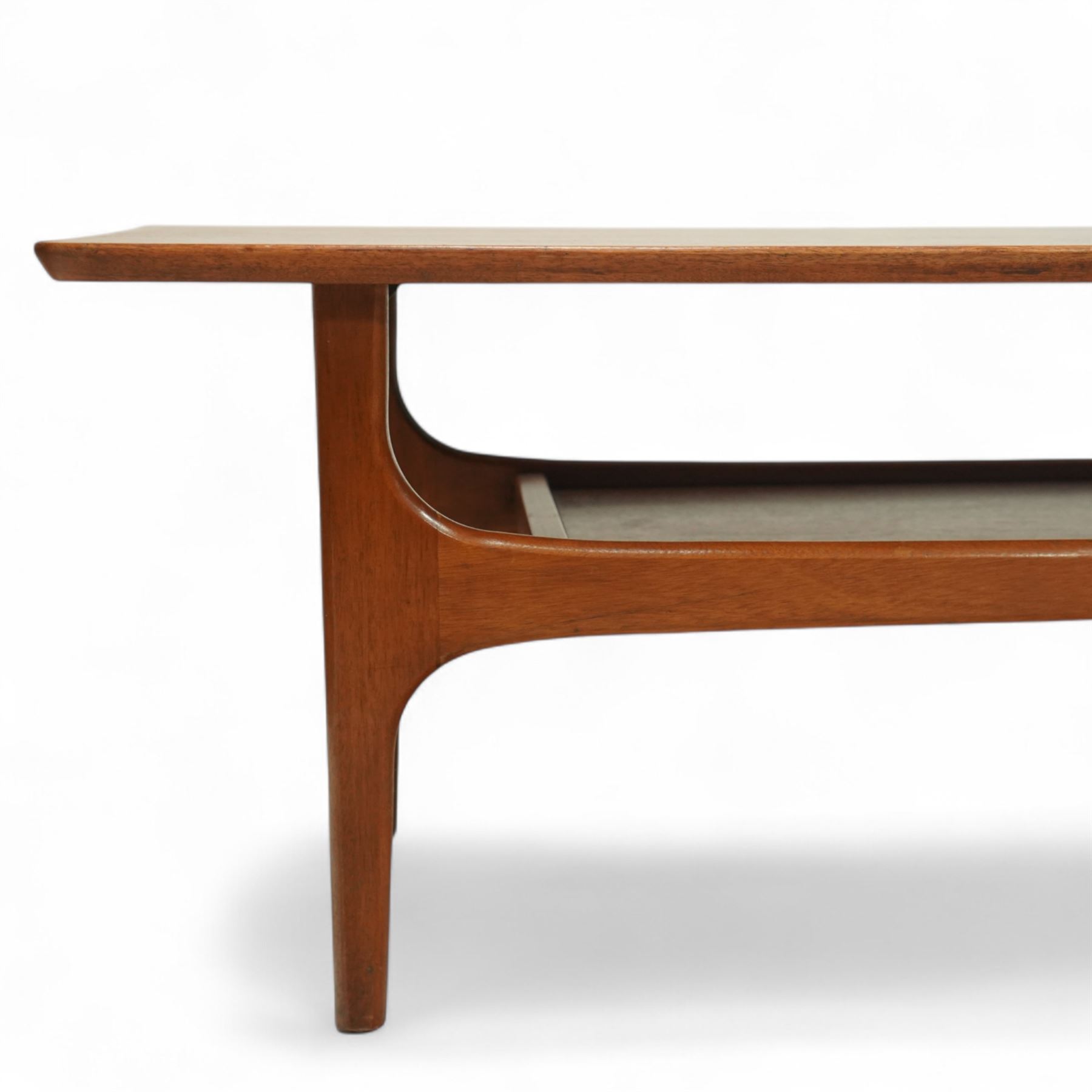 Jentique - Mid-century 'Stingray' teak coffee table, rectangular form with rounded corners, raised on shaped supports united by a magazine under tier 
