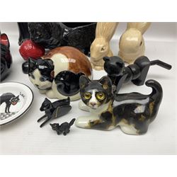 Two Sylvac rabbit figures and a collection of cat ceramics and collectables including planter, string dispenser, etc 