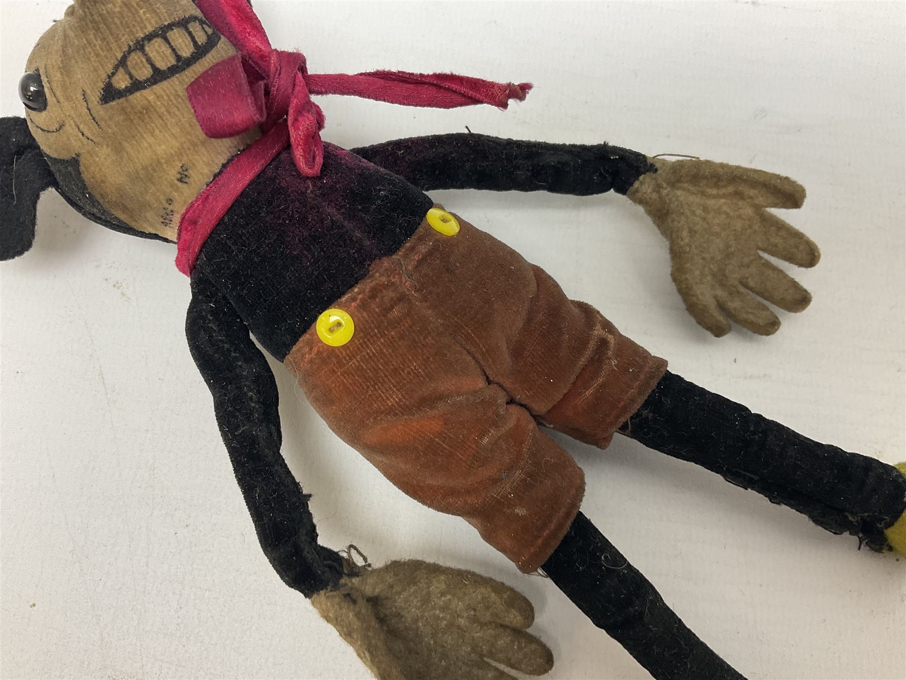 Deans Rag Book Mickey Mouse soft toy, circa 1930's, black velveteen head and body, with cream face and hands, red shorts and yellow felt shoes, marked Reg. No. 750811 to neck H19cm