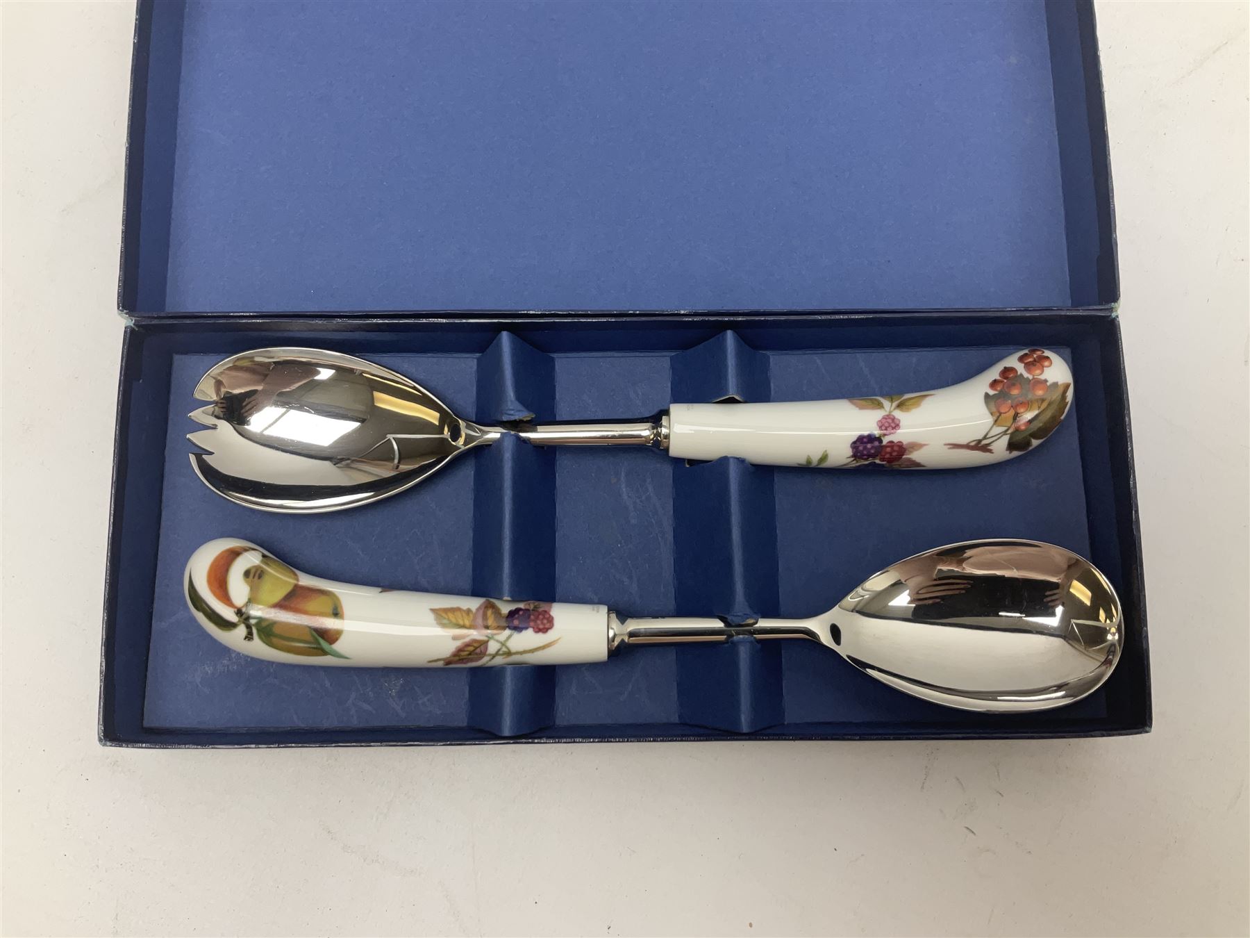 Royal Worcester Evesham and Evesham Vale tea and dinner wares, to include, three large covered tureens, coffee pot, eight tea cups and saucers, milk jug, two covered sucriers, boxed serving spoons etc, approx .130
