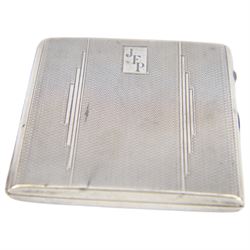 George III silver snuff box, of curved rectangular form with personal engraving to lid, hallmarked London 1805, together with two 1920s/30s silver cigarette cases, both hallmarked
