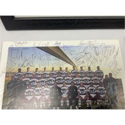 Hull F.C. memorabilia; Clive Sullivan 1986 memorial game programme, Open Evening 1994 programme with multiple player signatures, 'Old Faithful' 45rpm record, Wembley rosettes, 2000 team poster with facsimile signatures, framed print 'Farewell to the Boulevard 1895-2002', fully signed team photograph, various booklets, CD, DVD etc; and a folder containing the Merlin Rugby League card collection