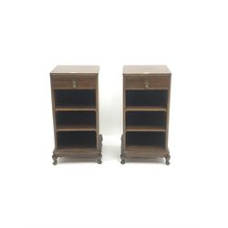 Pair 20th century mahogany lamp stands, single drawer above two open shelves, cabriole feet