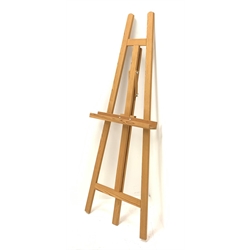 A pine floor standing artist's easel, approximately H160cm. 