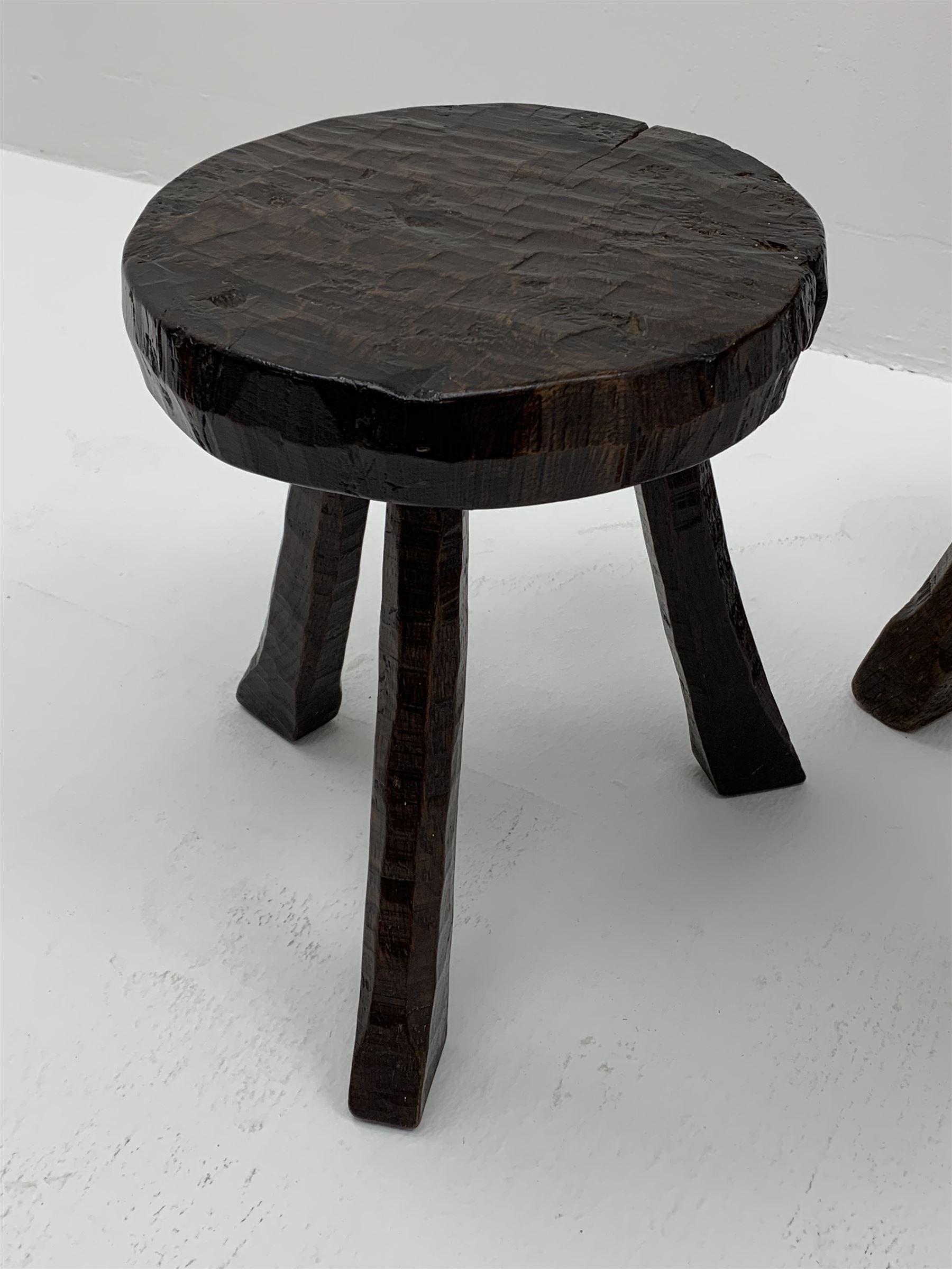 Collection of three mid 20th century stools by Jack Grimble of Cromer - rectangular tooled oak seat on four splayed supports (38cm x 31cm, H35cm), circular tooled burr oak seat on three supports (D29cm, H35cm), shaped burr top on three supports (L44cm, H45cm), each signed underneath