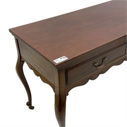 Late Victorian mahogany side table, rectangular top over two drawers and shaped apron, on cabriole supports with brass and ceramic castors