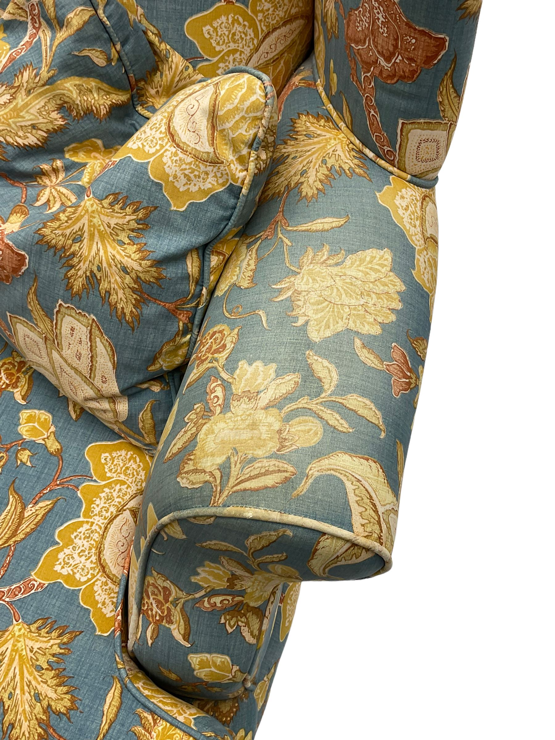 Lincoln House - two seat sofa (W170cm), wingback armchair (W94cm), and armchair (W90cm), upholstered in blue ground fabric with floral pattern