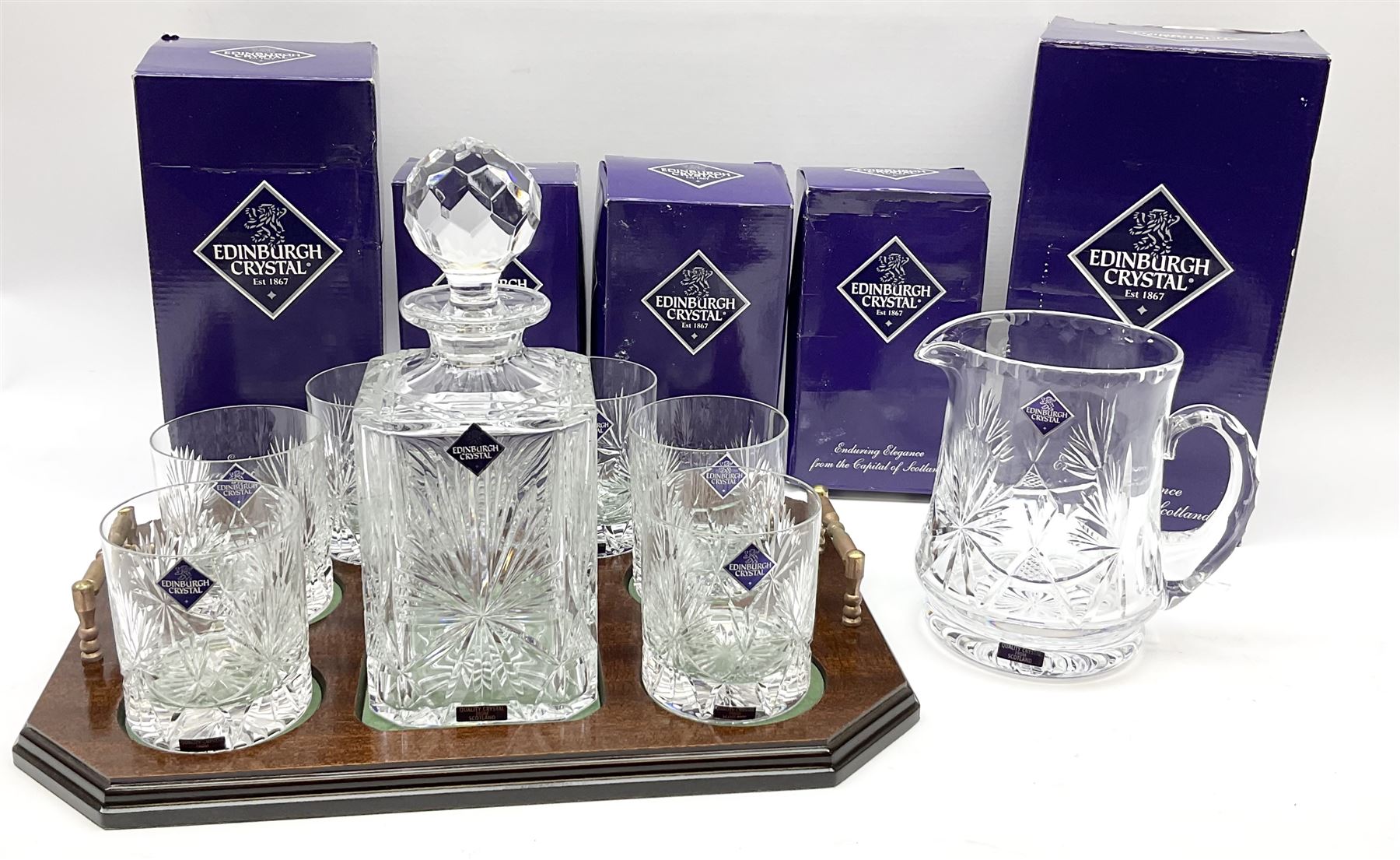 Edinburgh Crystal set, comprising square decanter, six old fashioned tumblers on a gallery tray, together with Edinburgh crystal water jug. 