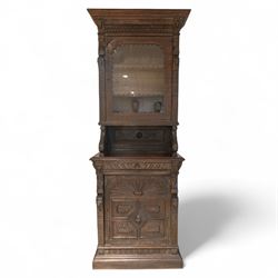 French carved oak cabinet in the Renaissance revival style, cornice carved with scrolling ...