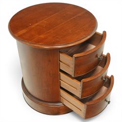 Willis & Gambier - circular chest, three drawers with brass pulls on a moulded 
