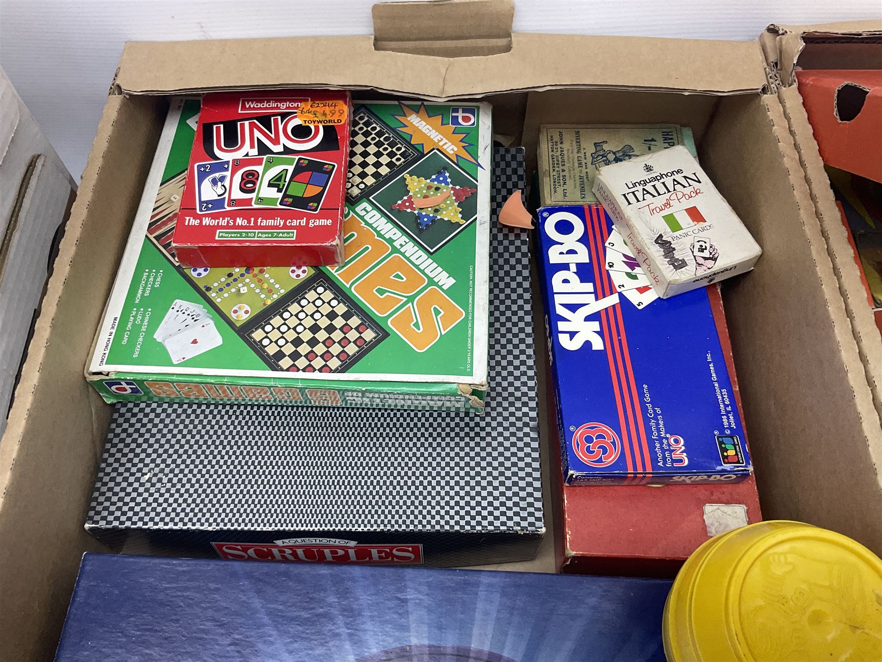 Selcol Beatles New Sound toy guitar, Triang baby walker, Mamod steam engine, wooden Noahs Ark toy, quantity of diecast cars and plastic soldiers and a collection of other toys and board games, in five boxes