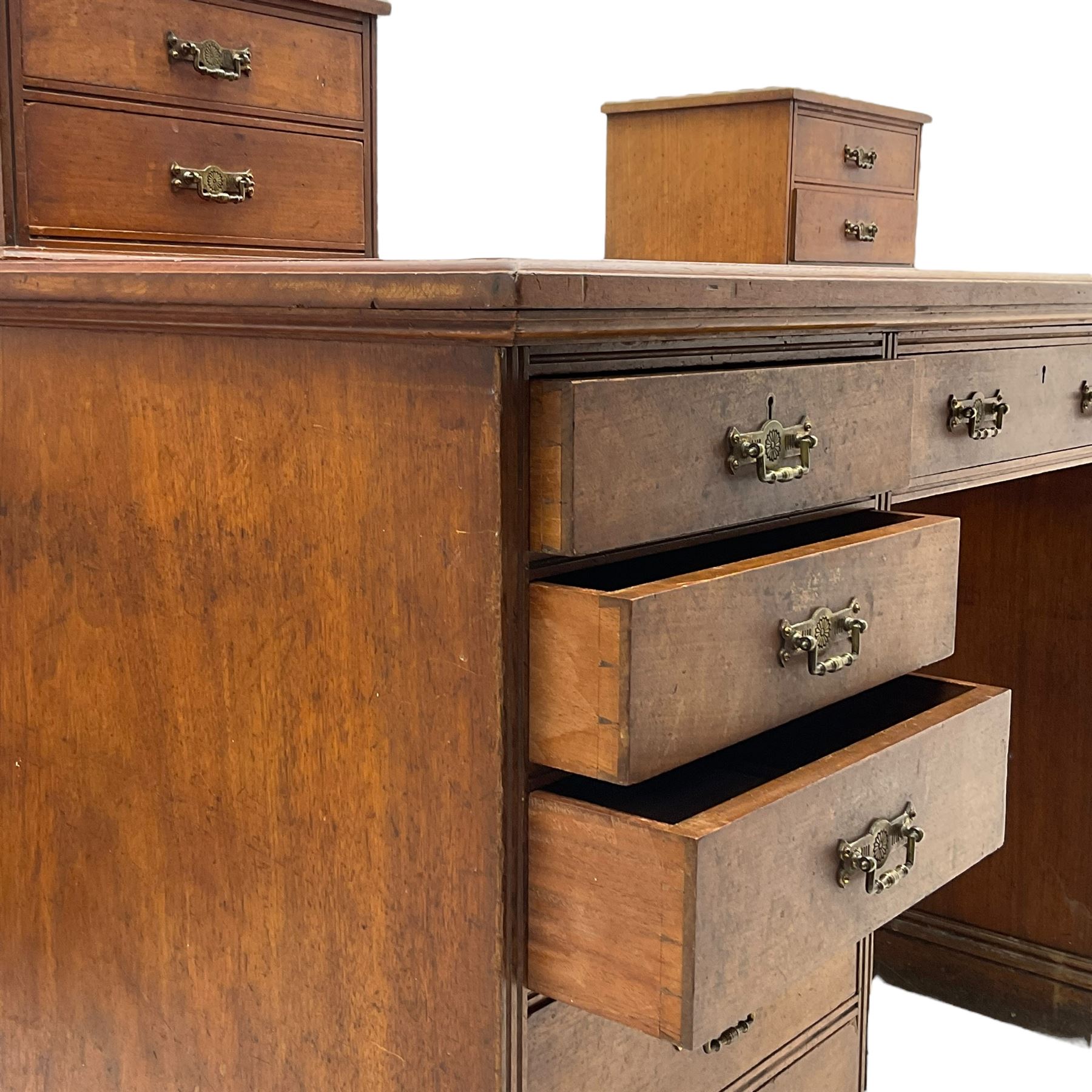 C. Hindley & Sons (London: 1820-1892) - Late Victorian walnut twin pedestal desk, the rectangular moulded top surmounted by two banks of two drawers over eleven graduating drawers, on moulded plinth base, the central drawer stamped 'C. Hindley & Sons, 134 Oxford Street, London, 5298'