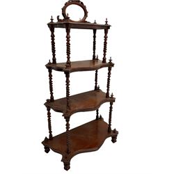 Victorian mahogany etagere, raised oval mirror in fretwork frame, four graduating shaped tiers, spiral turned supports