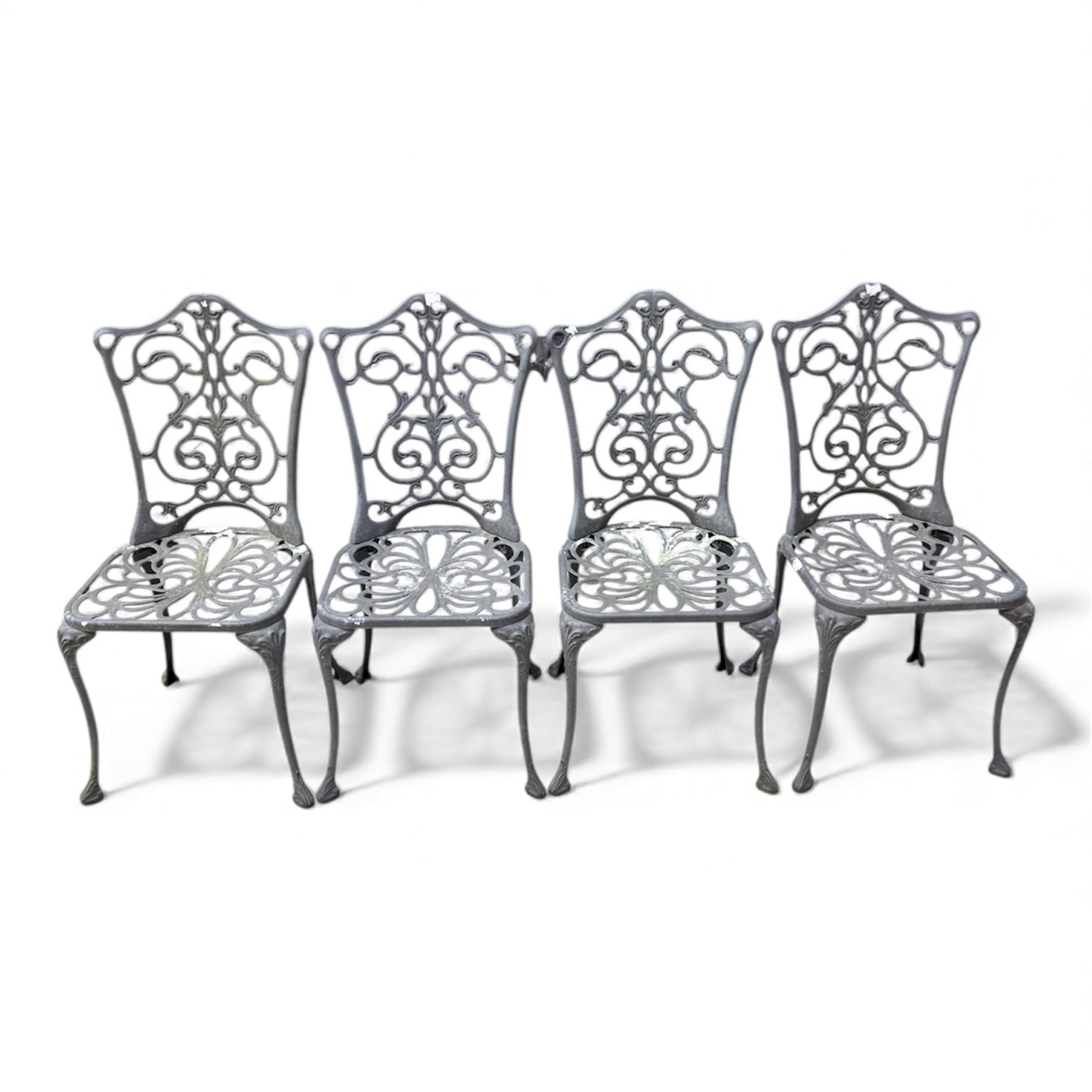 Cast aluminium garden table and four chairs in dark grey