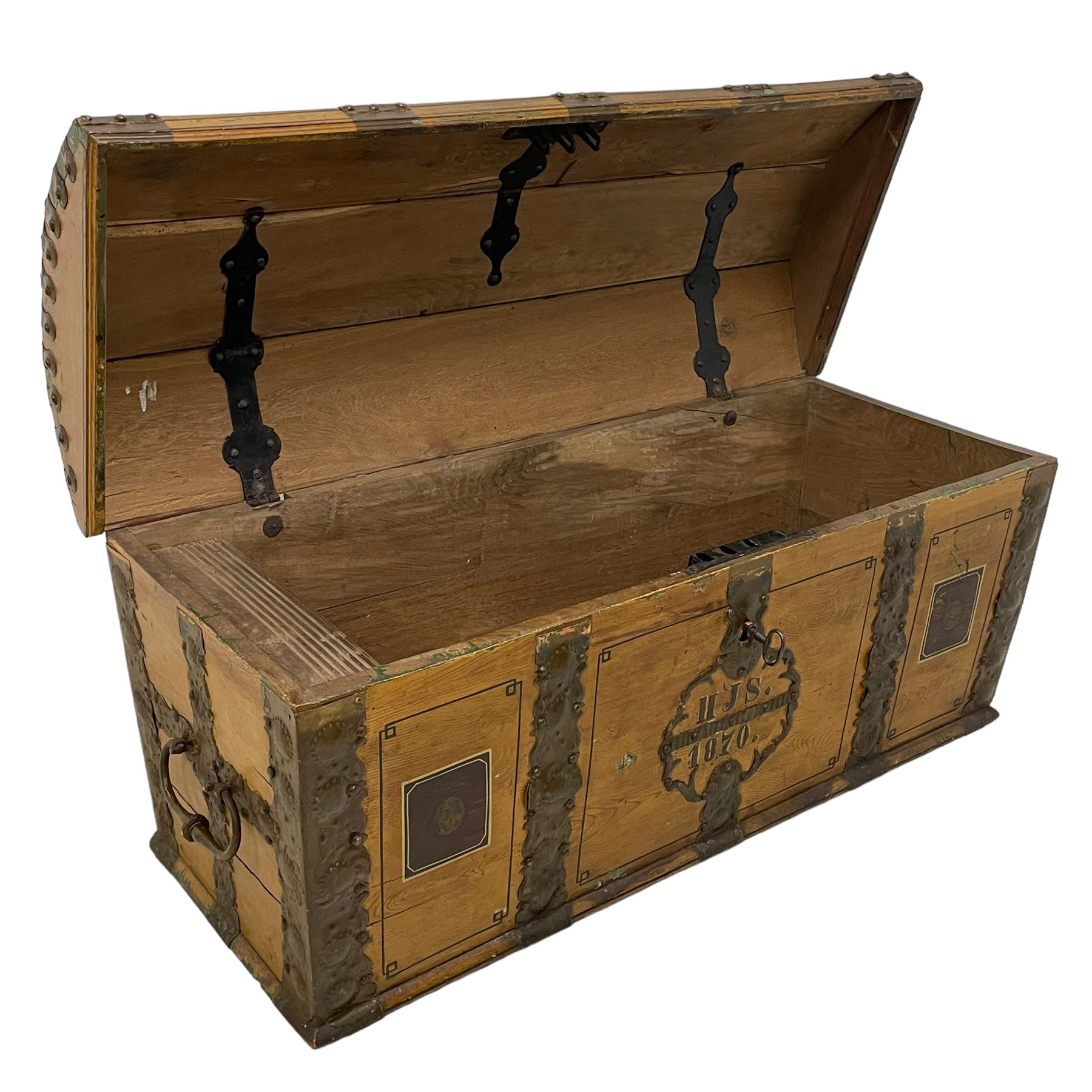 19th century painted oak sea chest, hinged dome top enclosing small compartment, bound by shaped and pressed metal strapwork, scumbled finish to resemble oak and painted with small vignettes depicting portraits and landscapes within panels, fitted with large wrought metal carrying handles, the front inscribed 'H.J.S. 1870' 