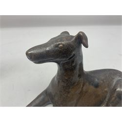 Wendy Abbott Salt; two studio pottery figures, of a black horse and a dog, both in a recumbent pose, H14cm 