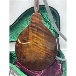 Eastman eight-string mandolin model MD504, serial no.140435406, L66cm; in TGI hard carrying case; together with case of instructional CDs