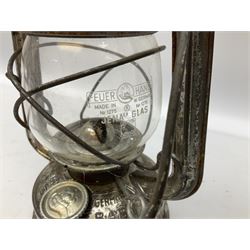 Copper and brass ship’s lamp marked ‘Anchor’, H25cm, Feuer hand storm lantern, Bialaddin Model 315 paraffin lamp and an Anchor lamp (4)