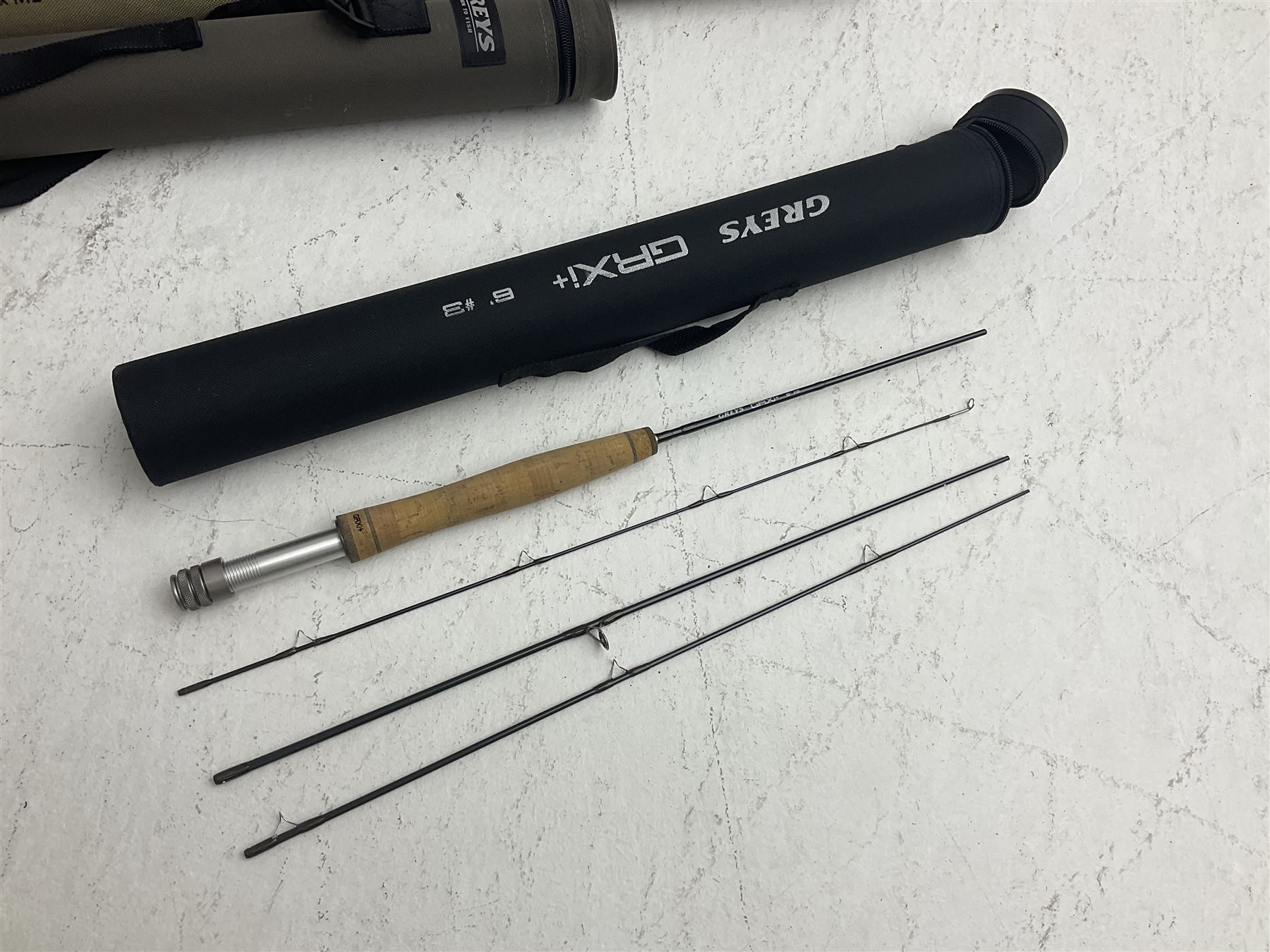Five fly fishing rods, to include Greys Greyflex M2, Greys Missionary 9'3 etc, together with fly reel, flies, Wychwood fishing bag and various fishing other tackle items 