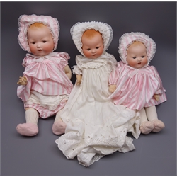  Three Armand Marseille 'My Dream Baby' bisque head dolls, each with moulded hair, sleeping eyes and open mouth with teeth, two with composition body and jointed limbs and one with soft body, one marked 'AM Germany 351/5K', one marked 'AM Germany 351/31/2K' and one marked 'AM Germany 351/?', largest H46cm (3)  