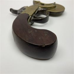 19th Century percussion eprouvette or gunpowder tester, with foliate engraved brass box lock and calibrated ratcheted wheel, steel trigger guard and walnut bag butt, L14cm