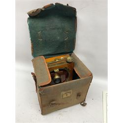 Sands Hunter & Co Ltd folding 1/4 plate camera in mahogany and lacquered brass, with two lenses and leather case