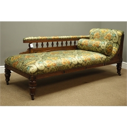  Late Victorian Aesthetic Movement oak framed chaise longue, ebonised and carved detail, spindle back, upholstered in Sanderson 'Cascacs' fabric decorated with flowers and urns, L175cm, H74cm, D67cm   