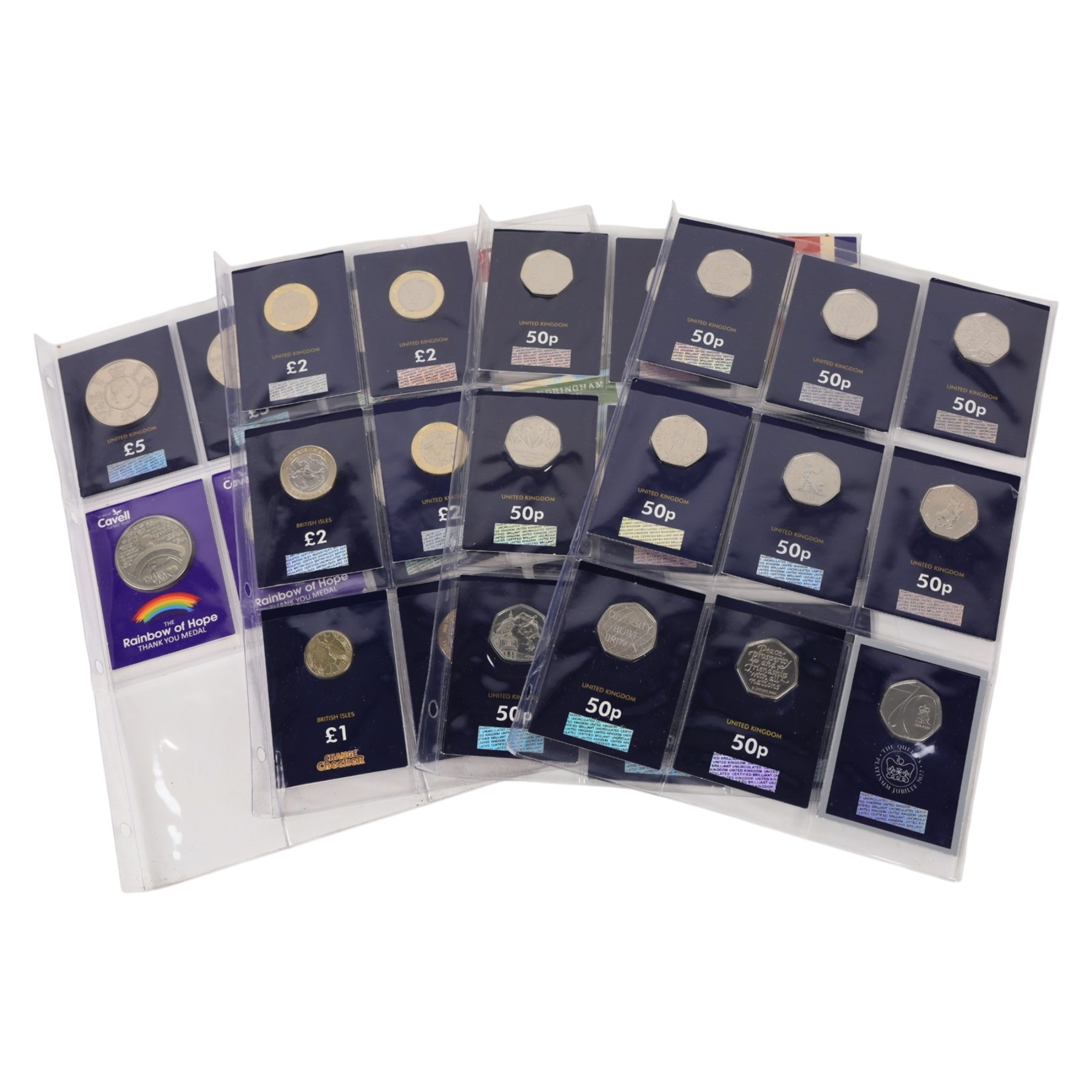 Mostly commemorative coins, including Queen Elizabeth II two pound and fifty pence coins on Change Checker cards, 'Prince Charles 70th Birthday Coin collection', etc