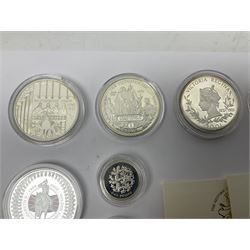 Thirteen silver coins, including Queen Elizabeth II Solomon Islands 2002 sterling silver five dollars, Alderney 2002 sterling silver five pounds, Fiji 2002 sterling silver ten dollars, United Kingdom 2003 one ounce fine silver Britannia, 2003 'Give Women The Vote' fifty pence etc, all with some form of certificate