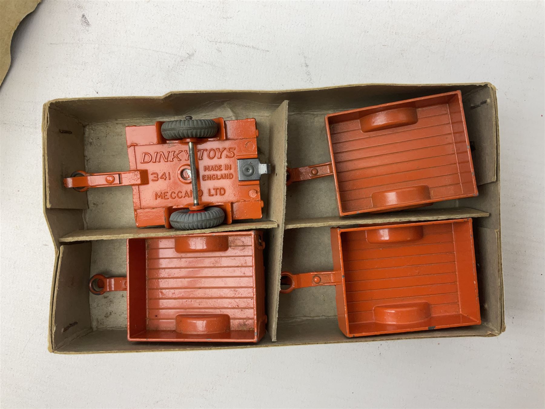 Dinky - trade shop stock box containing four Universal Jeeps No.25Y; and two others containing four Land-Rover Trailers No.27M and three (ex.4) Land-Rovers No.27D (3)