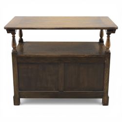 20th century oak monks bench with hinged box seat, with blind fretwork to the seat, panelled front and sides with linen fold panel in the centre