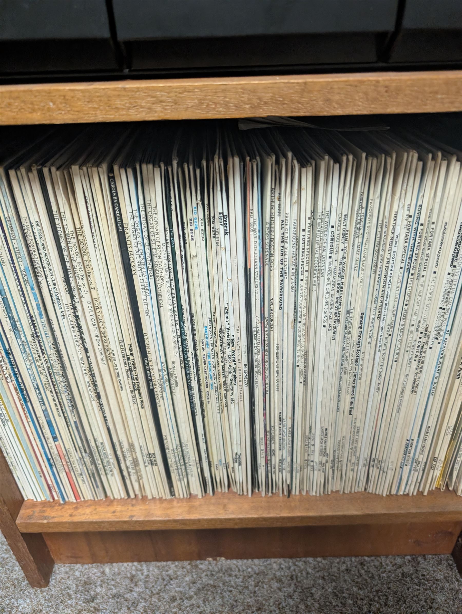 Large collection of vinyl LPs, together with a small collection of 7 inch vinyl records and CDs, with a Dansette record player and a small Hi-Fi cabinet