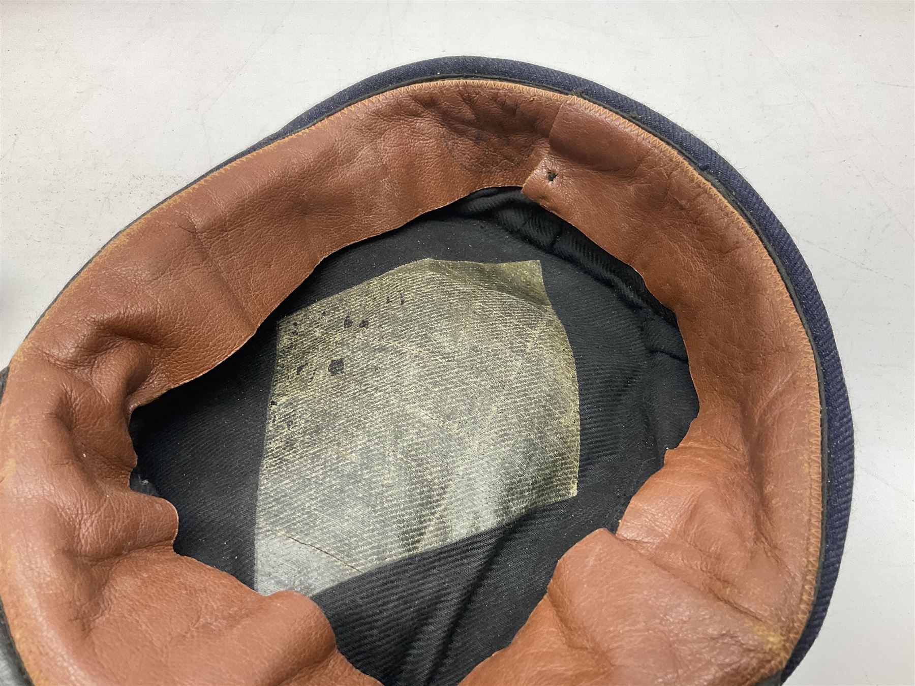 Black painted three colour railway lamp with revolving filters, H29cm; BR Acme Thunderer whistle; three railway peaked caps, two with BR Intercity 125 badge; small album of photographs of railway interest etc