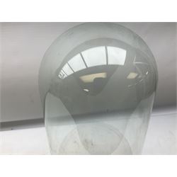 Glass dome display covers on a circular wooden base, H46cm