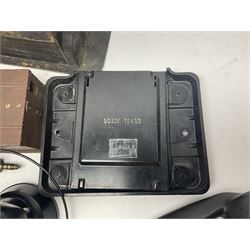 Collection of phone headsets, including GPO bakelite examples, together with other telephone parts 