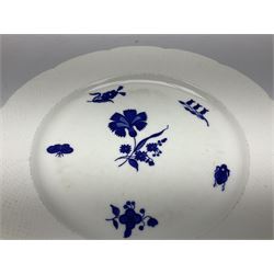 Three 19th century plates, comprising two circular examples and one oblong, each with osier moulded sides, the centres decorated in underglaze blue with Gillyflower type pattern, circular examples D25cm oblong example W27cm
