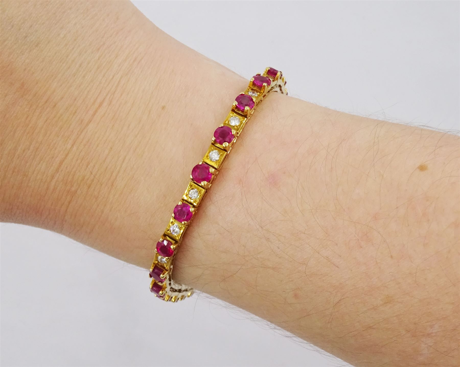 18ct gold ruby and round brilliant cut diamond bracelet, stamped 750, total ruby weight approx 5.75 carat