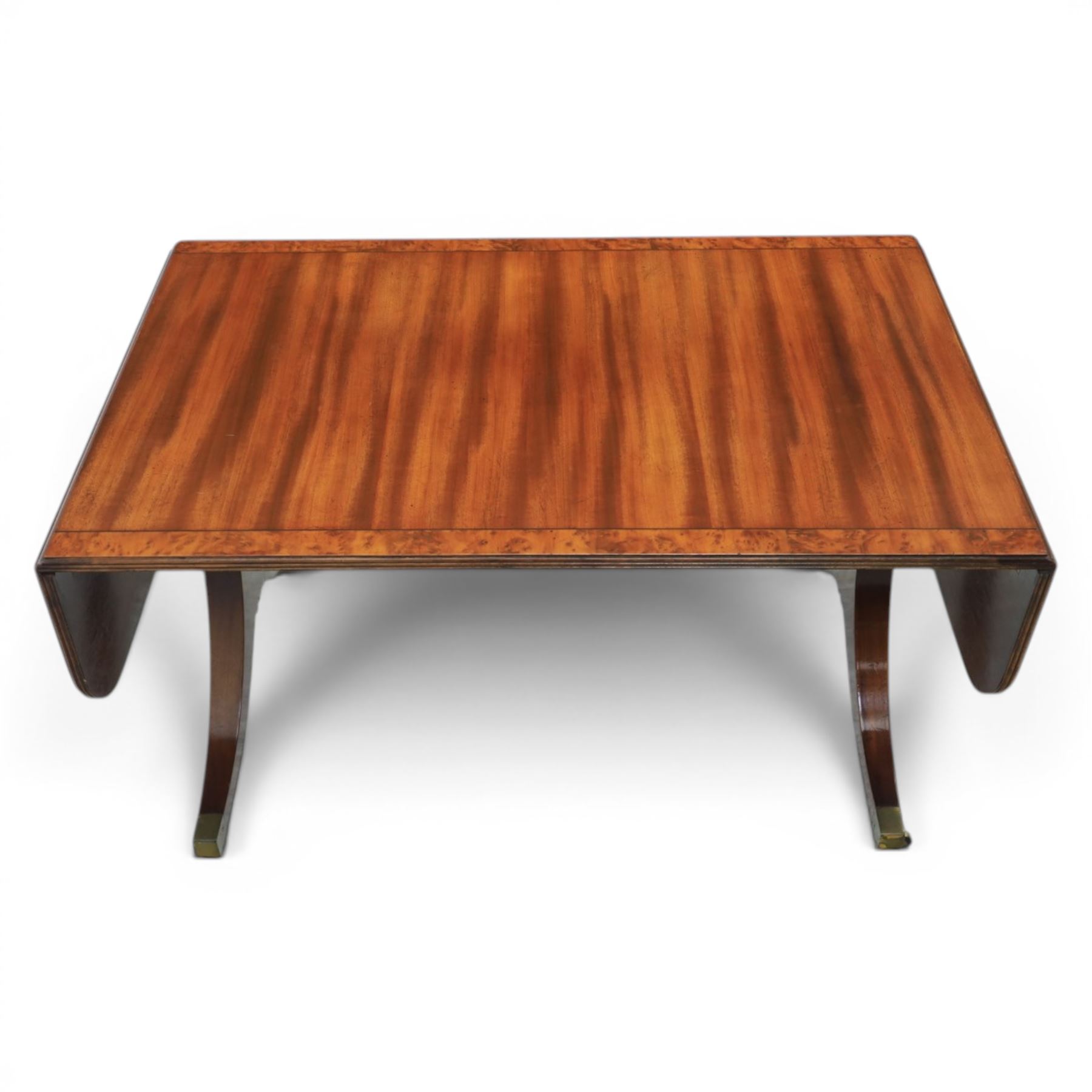Regency design mahogany drop leaf coffee table, rectangular top crossbanded in walnut, twin pillar legs