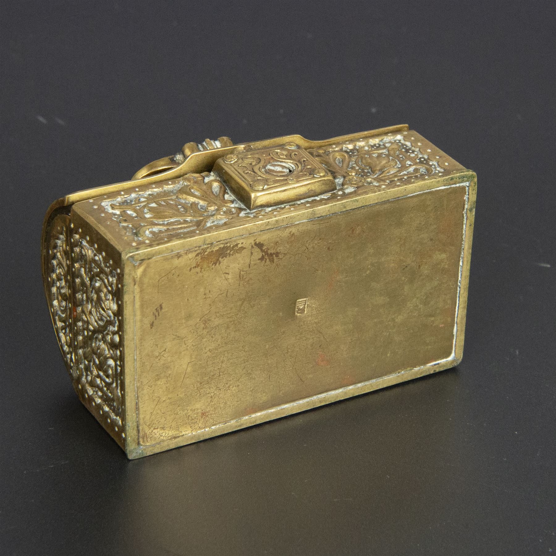 Gilt bronze mounted black glass seal, contained within a brass casket, with velvet interior and inner label reading 'C. F. Schmedding Augsburg', together with a porcelain handled seal decorated with floral sprays on a pink ground