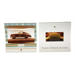 Two Porsche calendars comprising the years 2000 and 2001
