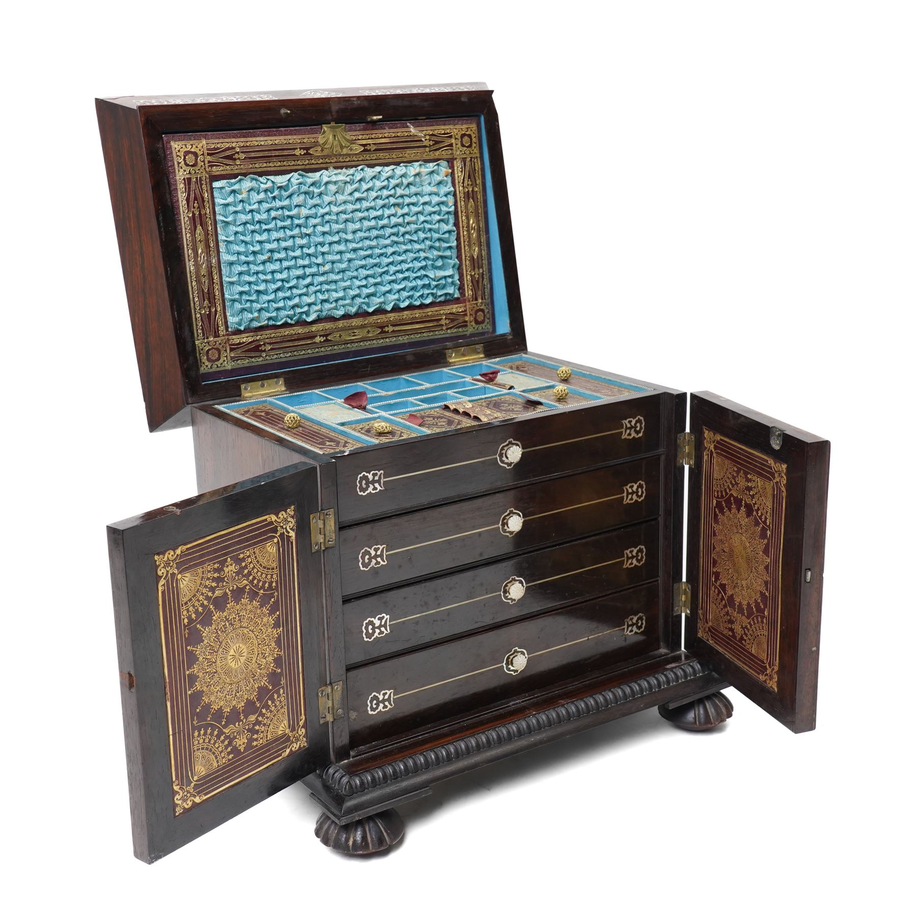 Early Victorian rosewood and mother of pearl inlaid sewing, jewellery, and writing casket  with hinged lid, the upper section fitted for sewing implements, above four drawers, the bottom drawer with writing slope and on compressed fluted feet H36cm x W34cm