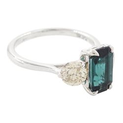 Platinum green tourmaline and diamond three stone ring, single octagonal cut tourmaline of 1.54 carat, with a single round brilliant cut diamond set either side, stamped Plat 950, total diamond weight 1.06 carat