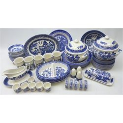  Blue and white Willow pattern dinnerware by Churchill, Woods etc (69)  