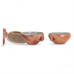 John Leach (1939-2021) for Muchelney Pottery twin handed casserole dish and cover, W20cm, together with a pair of Svend Bayer stoneware bowls, with loop handles and blue glazed interior (3)